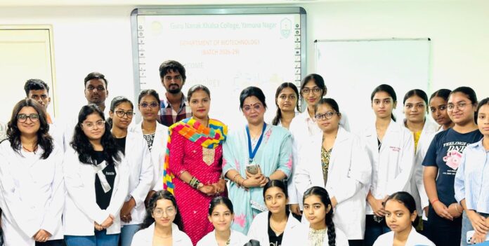 Guru Nanak Khalsa College biotechnology faculty interacting with newly admitted students during an orientation programme.