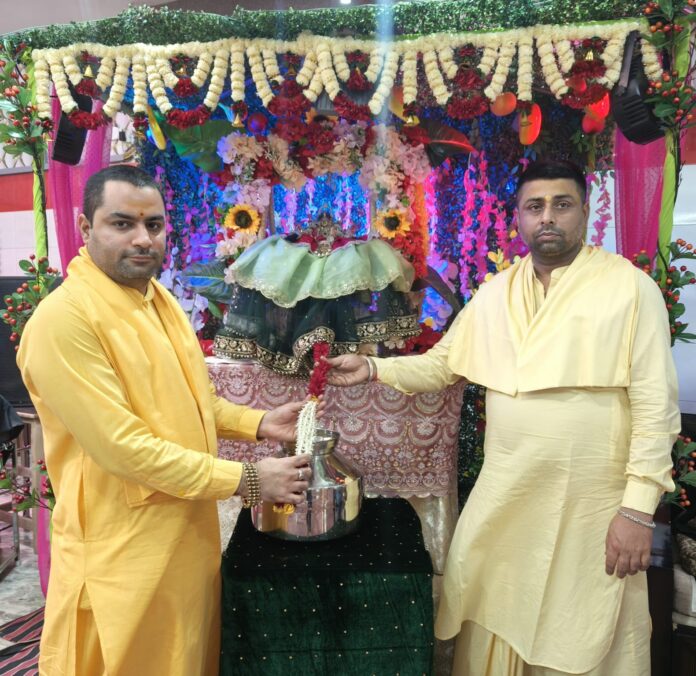 Devotees offering prayers during the Sawan Ashtami and Jhoola Utsav celebrations at Jwala Mata Temple in Yamunanagar.