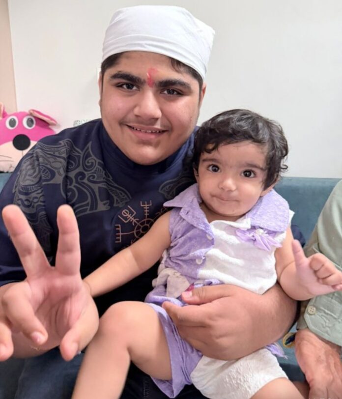 Tarini celebrating Raksha Bandhan by tying a rakhi on her brother Devansh’s wrist.
