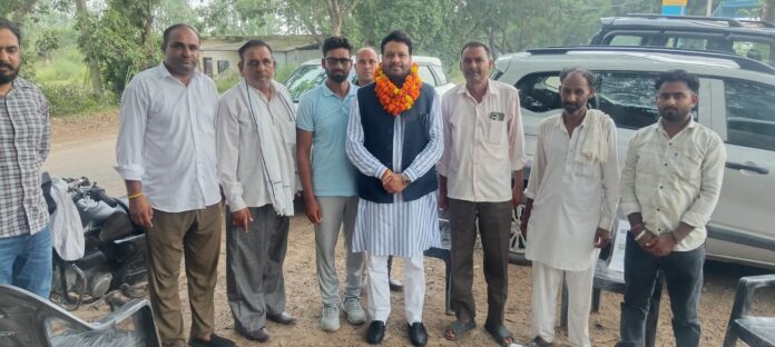 Advocate Sanjeev Gharu interacting with villagers in Bilaspur block, Yamunanagar.