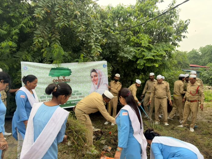Sant Nirankari Mission volunteers planting saplings during the Oneness Van environmental campaign at Yamunanagar Civil Hospital.