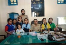 New Happy Public School Students Celebrate Raksha Bandhan with Police Personnel in Vyas Pur Students of New Happy Public School Vyas Pur tie rakhis to police personnel during Raksha Bandhan celebrations in Yamunanagar