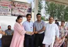 Krida Bharati Launches Sports Fortnight in Yamunanagar with Hockey Competition District Sports Officer Shilpa Gupta with young hockey players at a Krida Bharati sports event in Yamunanagar.