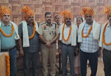 Six Yamunanagar Police Personnel Bid Farewell After Distinguished Service ASP Ashish Chaudhary with retiring police personnel during a farewell ceremony at District Police Lines Jagadhri.