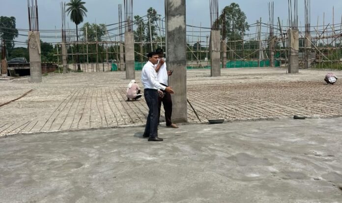 Additional Municipal Commissioner Dheeraj Kumar reviewing construction work for a ₹7.24 lakh tin shed and paved waste processing area at the Kail waste disposal plant in Yamunanagar.