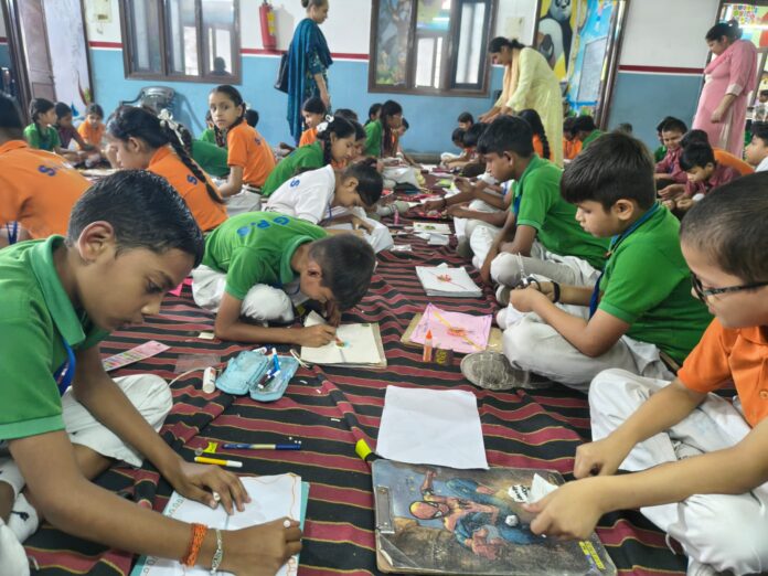 Students making eco-friendly rakhis from reusable waste materials during the Bandhan Swachhta Ka cleanliness and environmental awareness programme at Geeta Vidya Public School in Yamunanagar.