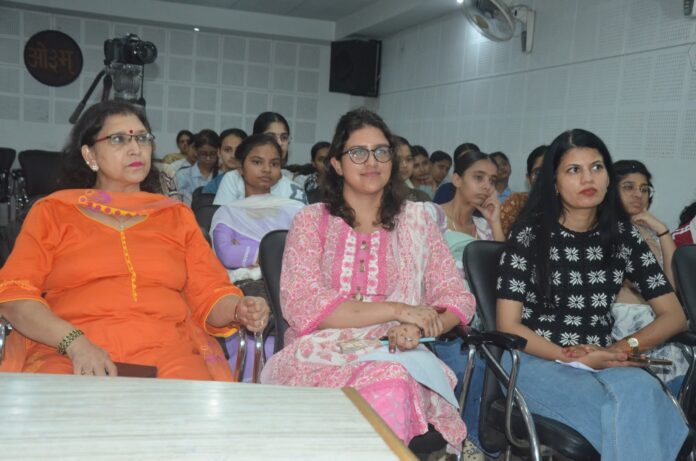 Experts address students during a research proposal writing and funding opportunities session at DAV Girls College Yamunanagar.