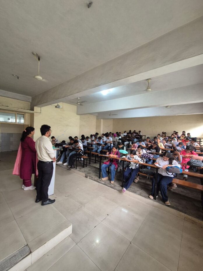 Students participating in a road safety and traffic rules quiz at Maharaja Agrasen College Jagadhri.