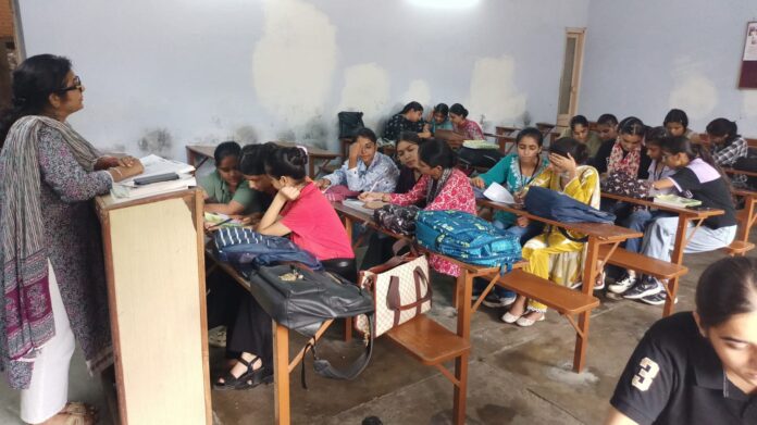 Students taking part in a road safety and traffic rules quiz at DAV Girls College Yamunanagar.