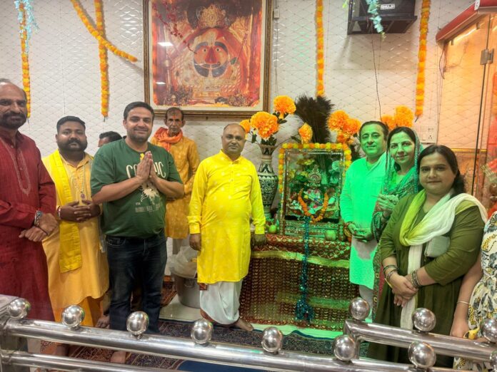 Devotees participating in Shri Krishna Janmashtami celebrations at Shri Shani Dev Temple in Yamunanagar