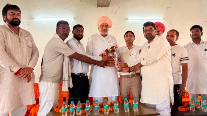 Haryana Agriculture Minister Shyam Singh Rana interacts with villagers in Radaur
