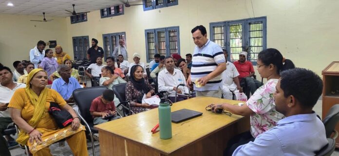 Beneficiaries undergoing assessment at the Red Cross Society and ALIMCO camp in Saraswati Nagar