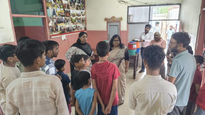 CJM Nitika Bhardwaj interacts with children during an inspection of a child care centre in Ladwa, Kurukshetra