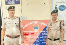 Gandhinagar Police Arrest Suspect in Alleged AC Copper Pipe Theft Case Gandhinagar Police officers with a suspect arrested in an alleged AC copper pipe theft case in Yamunanagar