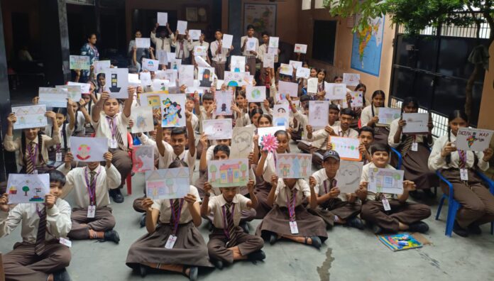 Golden High School students participating in a drawing and painting competition in Yamunanagar