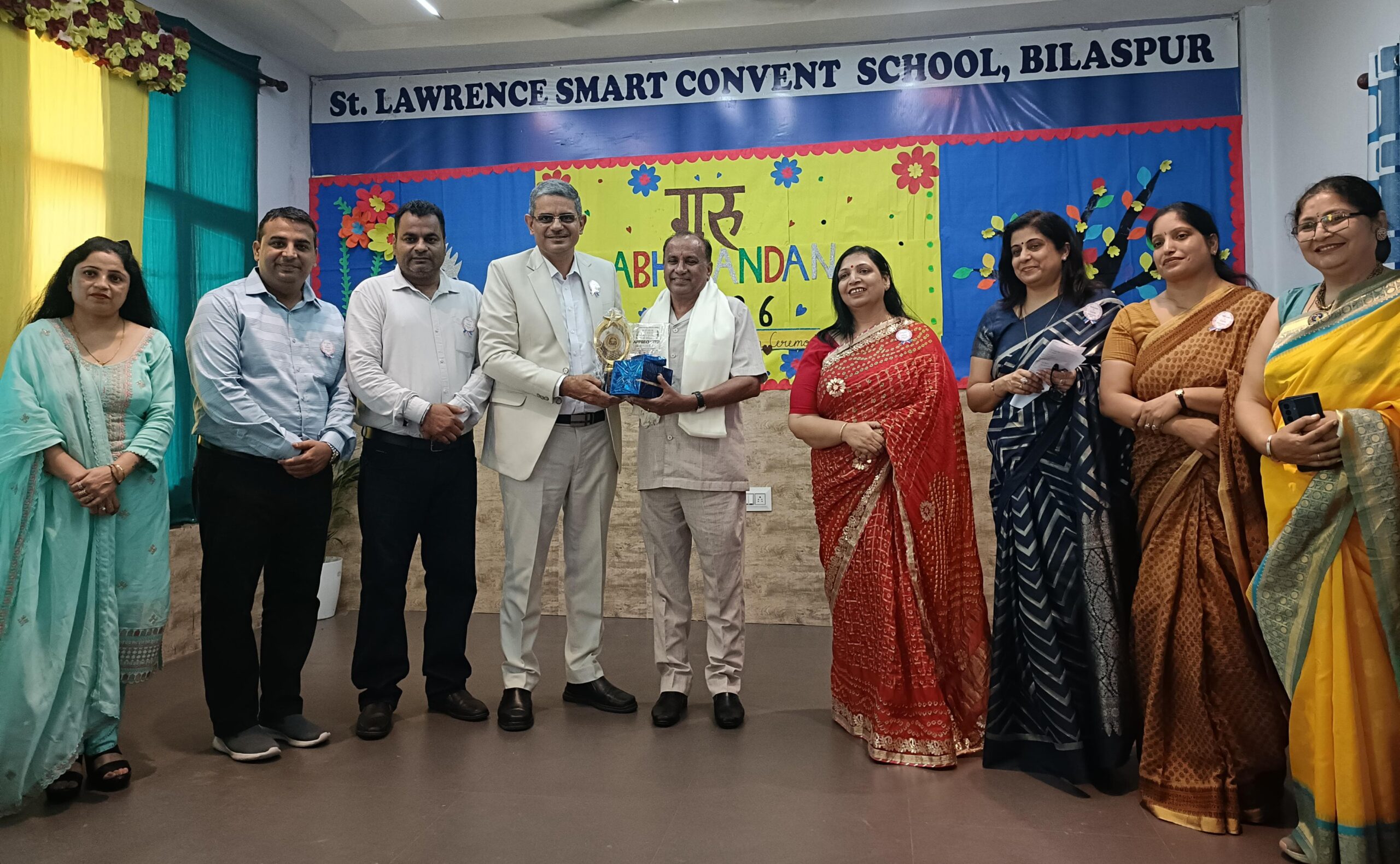 Teachers and staff members gathered during Guru Abhinandan teacher honour ceremony at St Lawrence Smart Convent School Bilaspur