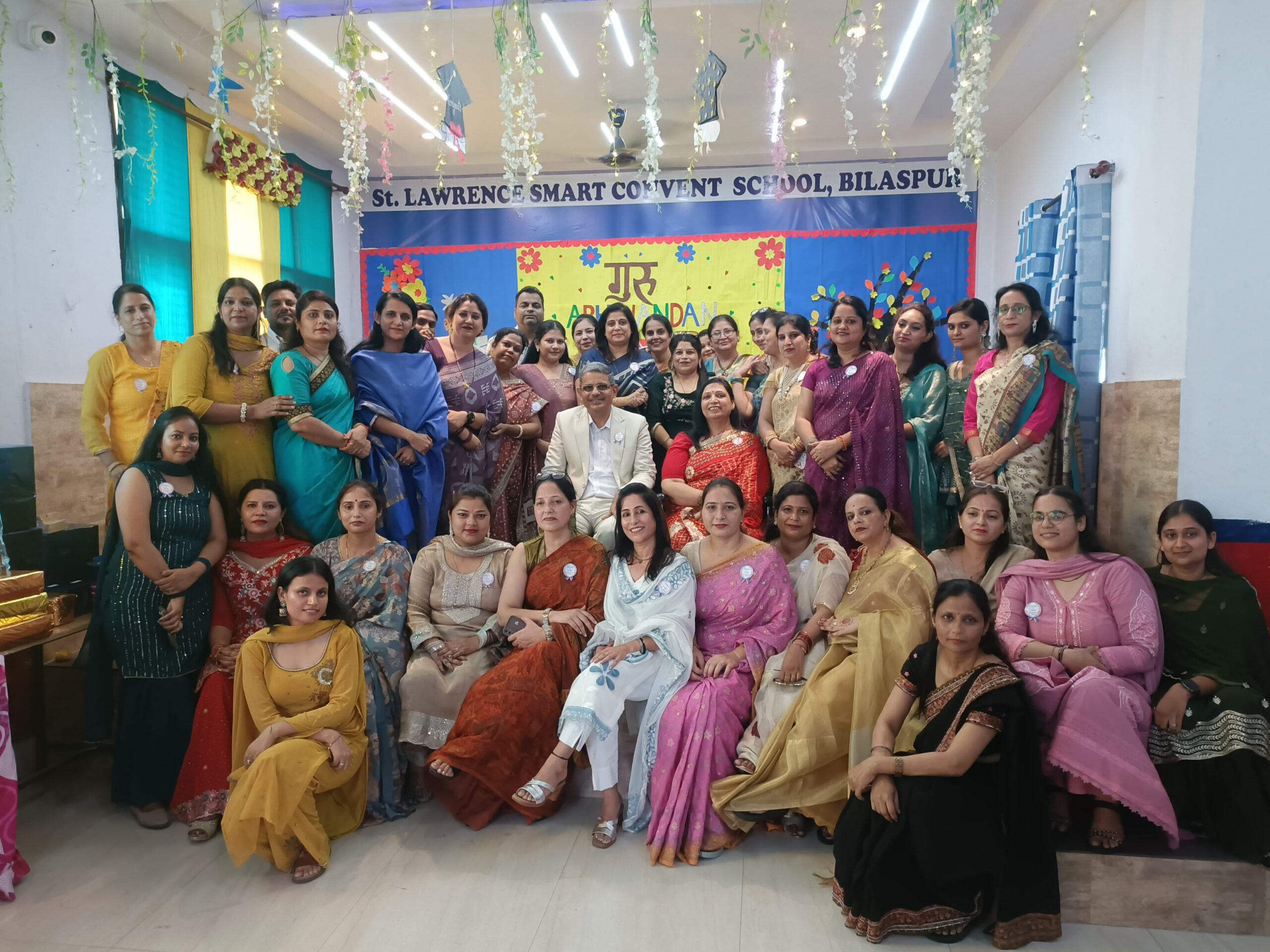 Teachers and school officials pose during Guru Abhinandan teacher honour ceremony at St Lawrence Smart Convent School Bilaspur