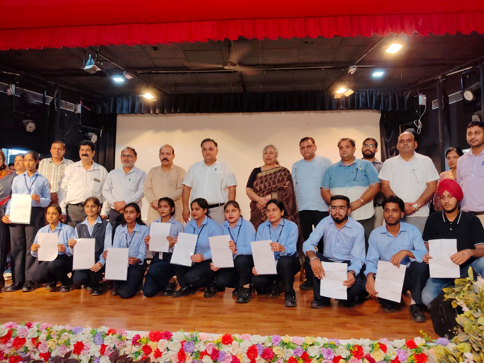 Students display appointment letters during Mega Job Fair 2026 at Maharaja Agrasen College in Yamunanagar