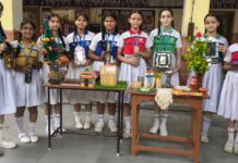 Students Turn Waste into Art, Raise Green Message at Yamunanagar School SD Public School students display waste-to-art creations and plants during an environmental awareness programme in Yamunanagar