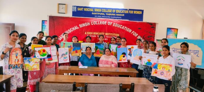 Students of Sant Nischal Singh College of Education for Women Santpura Yamunanagar display paintings during a talent hunt