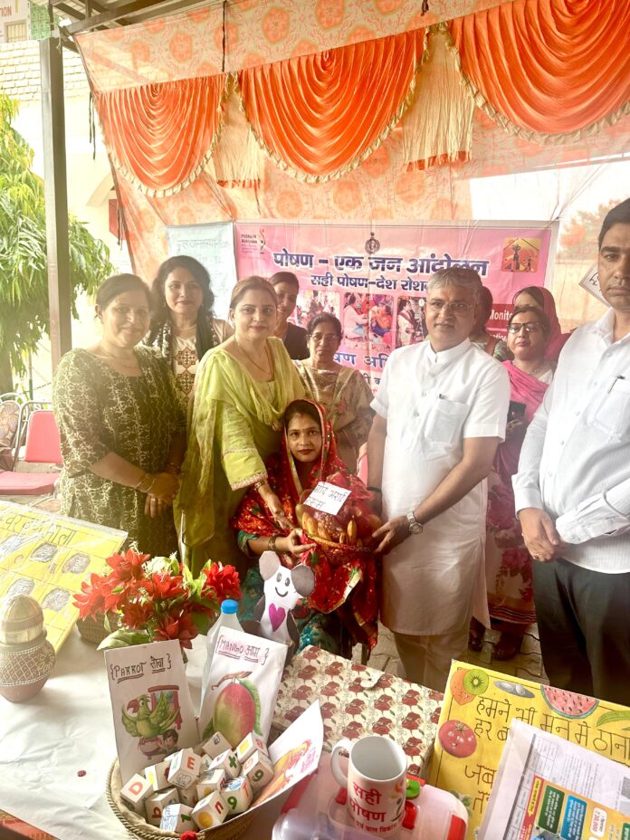 Officials and villagers during a Seva Setu camp at Jathlana in Radaur block