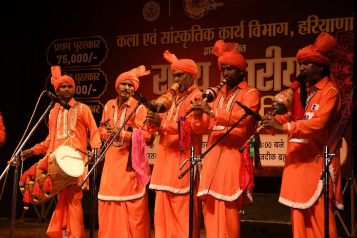 Traditional folk artists perform during Haryana state-level Been competition in Kurukshetra