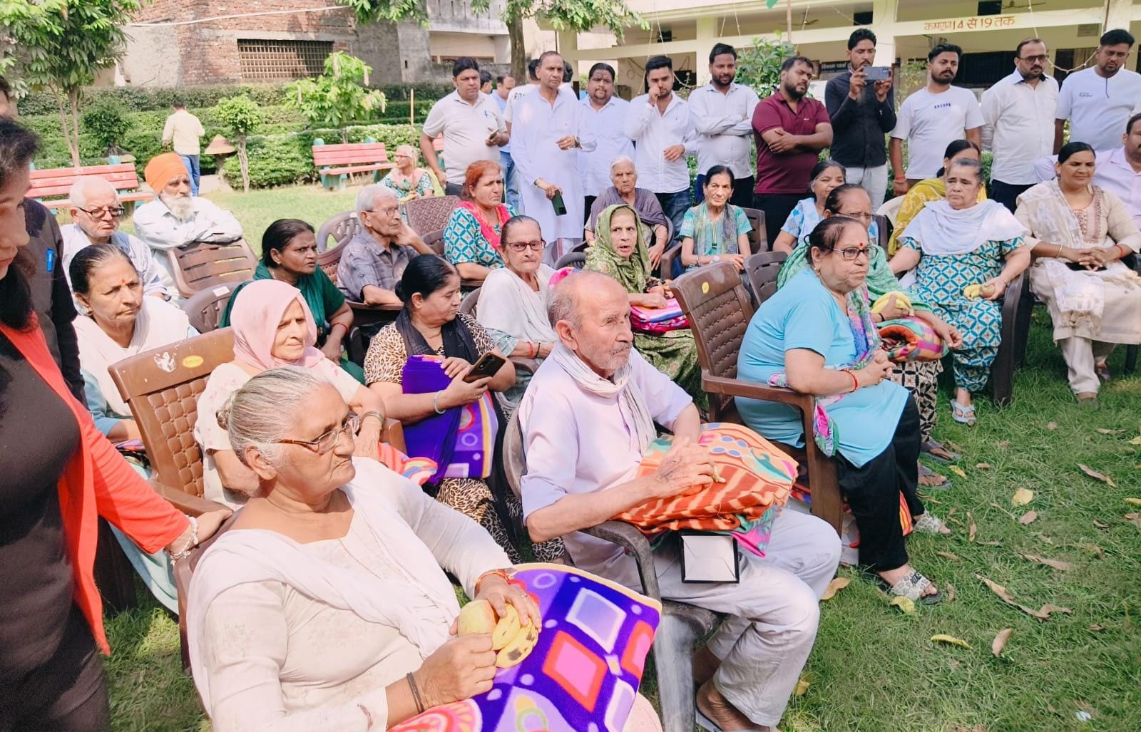 Elderly residents and visitors attend a Seva Sankalp Abhiyan programme at a Jagadhri old-age home