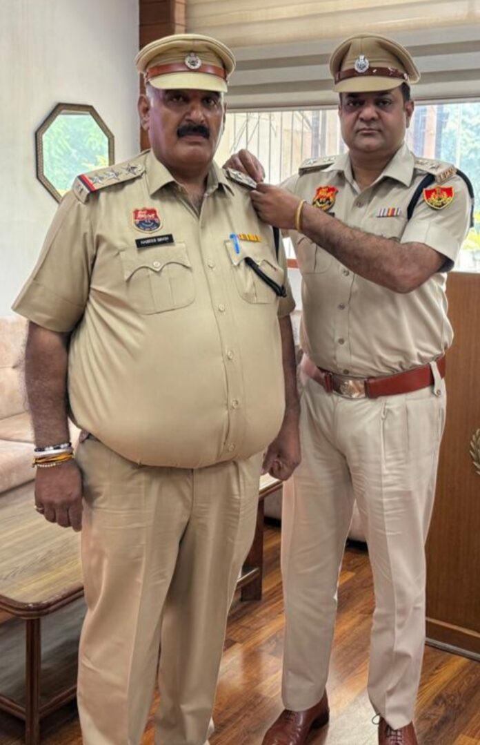 SP Kamaldeep Goyal pins stars on newly promoted Inspector Naseeb Singh